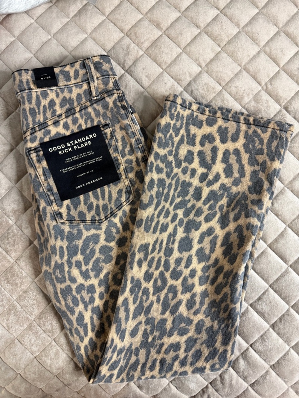 Good American Leopard Kick Flare Jeans in Taupe and Charcoal